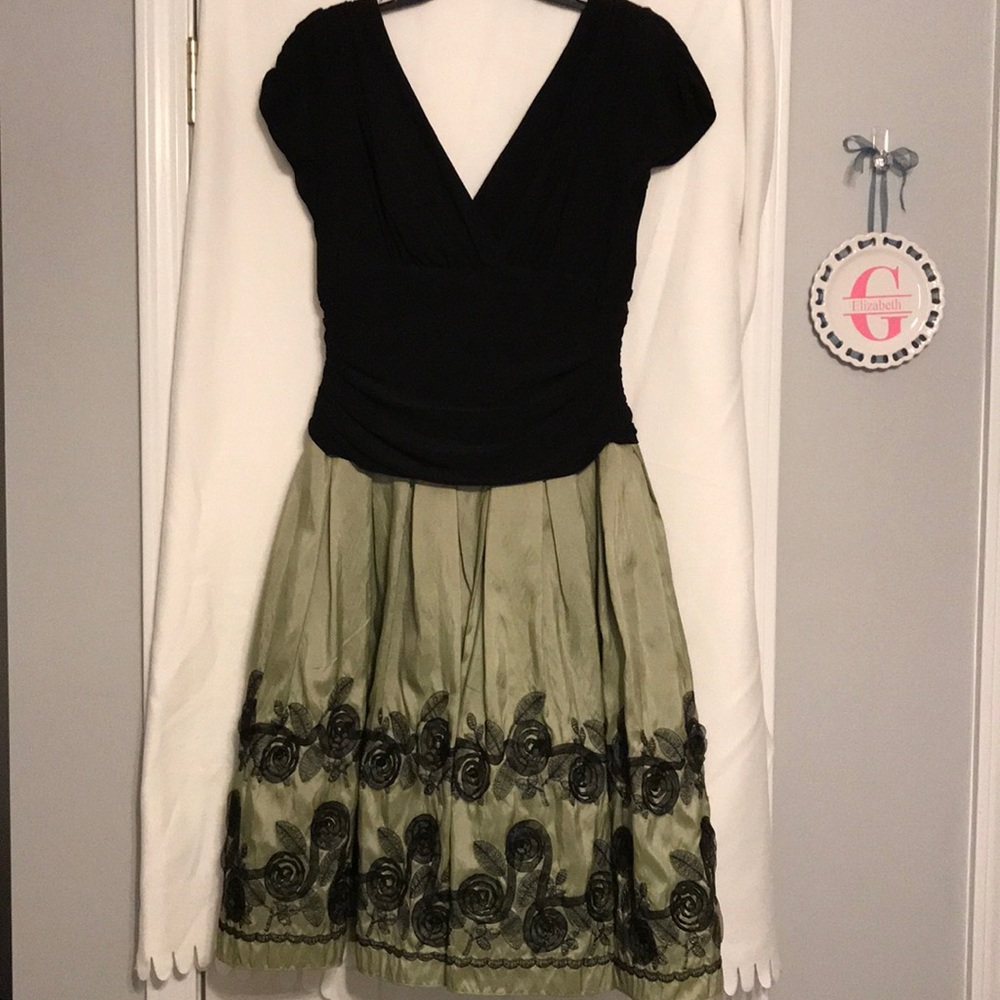Green and black dress